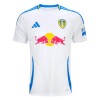 Camisola Leeds United Criança 1º Equipamento 2024-25 Manga Curta